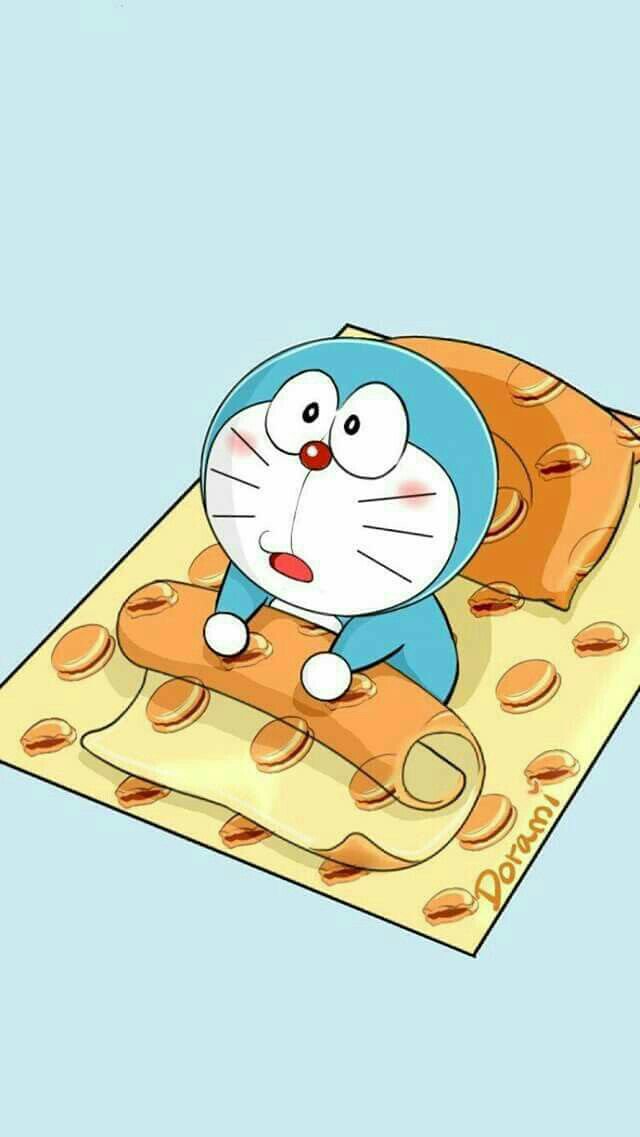 Hình ảnh chú mèo máy đáng yêu Doraemon vừa ngủ dậy